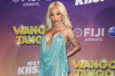 Amerikalı rapçi ve şarkıcı Doja Cat (Amala Ratna Zandile Dlamini) 10 Mayıs 2025 tarihinde Huntington City Beach, Orange County, California, ABD 'de düzenlenen Fiji Airways tarafından sunulan iHeartRadio 102.7 KIIS FM Wango 2025' e ulaştı..