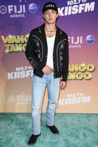 Amerikalı aktör, şarkıcı, söz yazarı ve gitarist Asher Angel, 10 Mayıs 2025 tarihinde Huntington City Beach, Orange County, California, ABD 'de düzenlenen Fiji Airways tarafından sunulan iHeartRadio 102.7 KIIS FM Wango 2025' e ulaştı.