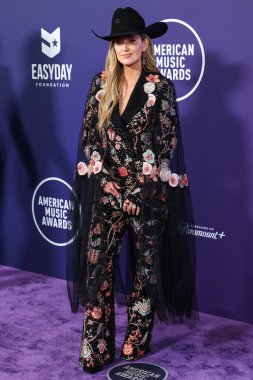 Rahul Mishra 'yı giyen Lainey Wilson, 26 Mayıs 2025' te Las Vegas Fontainebleau 'da düzenlenen 2025 Amerikan Müzik Ödülleri' ne ulaştı..         