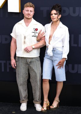 Johnny McIntyre ve Amy Cortes Lopez Netflix Tudum 2025 'e vardılar: 31 Mayıs 2025' te Kia Forum 'da düzenlenen canlı etkinlik Inglewood, Los Angeles, Kaliforniya, ABD.