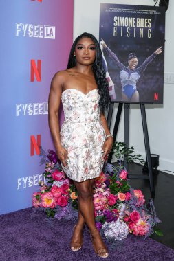 Amerikalı jimnastikçi Simone Biles, Netflix FYSEE LA - Simone Biles Rising 'Sezon 1 ATAS (Televizyon Sanatları ve Bilimleri Akademisi) Emmy FYC' ye (Düşünceleriniz İçin) 2 Haziran 2025 'te Hollywood Atletizm Kulübü' nde düzenlenen etkinliğe katıldı.                