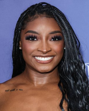 Amerikalı jimnastikçi Simone Biles, Netflix FYSEE LA - Simone Biles Rising 'Sezon 1 ATAS (Televizyon Sanatları ve Bilimleri Akademisi) Emmy FYC' ye (Düşünceleriniz İçin) 2 Haziran 2025 'te Hollywood Atletizm Kulübü' nde düzenlenen etkinliğe katıldı.                
