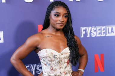 Amerikalı jimnastikçi Simone Biles, Netflix FYSEE LA - Simone Biles Rising 'Sezon 1 ATAS (Televizyon Sanatları ve Bilimleri Akademisi) Emmy FYC' ye (Düşünceleriniz İçin) 2 Haziran 2025 'te Hollywood Atletizm Kulübü' nde düzenlenen etkinliğe katıldı.                