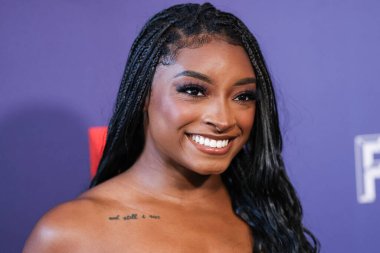 Amerikalı jimnastikçi Simone Biles, Netflix FYSEE LA - Simone Biles Rising 'Sezon 1 ATAS (Televizyon Sanatları ve Bilimleri Akademisi) Emmy FYC' ye (Düşünceleriniz İçin) 2 Haziran 2025 'te Hollywood Atletizm Kulübü' nde düzenlenen etkinliğe katıldı.                