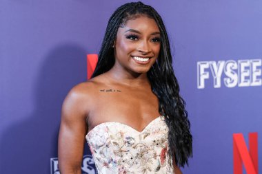 Amerikalı jimnastikçi Simone Biles, Netflix FYSEE LA - Simone Biles Rising 'Sezon 1 ATAS (Televizyon Sanatları ve Bilimleri Akademisi) Emmy FYC' ye (Düşünceleriniz İçin) 2 Haziran 2025 'te Hollywood Atletizm Kulübü' nde düzenlenen etkinliğe katıldı.                