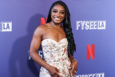 Amerikalı jimnastikçi Simone Biles, Netflix FYSEE LA - Simone Biles Rising 'Sezon 1 ATAS (Televizyon Sanatları ve Bilimleri Akademisi) Emmy FYC' ye (Düşünceleriniz İçin) 2 Haziran 2025 'te Hollywood Atletizm Kulübü' nde düzenlenen etkinliğe katıldı.                