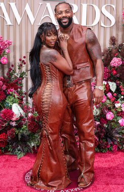 LOS ANGELES, CALIFORNIA, ABD - Haziran 09: Amerikalı rapçi ve aktris Kash Doll (Arkeisha Antoinette Knight) ve Amerikalı profesyonel futbolcu Za 'Darius Smith BET Ödülleri 2025' e geldiler (25.)