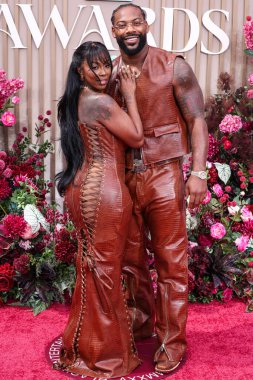 LOS ANGELES, CALIFORNIA, ABD - Haziran 09: Amerikalı rapçi ve aktris Kash Doll (Arkeisha Antoinette Knight) ve Amerikalı profesyonel futbolcu Za 'Darius Smith BET Ödülleri 2025' e geldiler (25.)