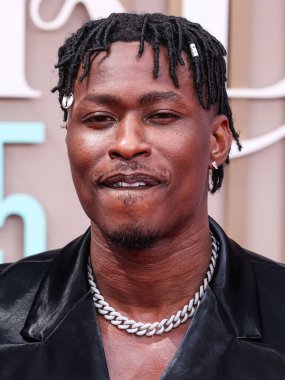 LOS ANGELES, CALIFORNIA, USA - JUNE 09: American R&B singer-songwriter Lucky Daye (David Debrandon Brown) arrives at the BET Awards 2025 (25th Annual BET Awards) held at Peacock Theater 