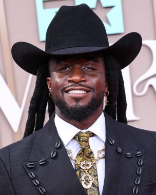 Shaboozey wearing custom Eleven Sixteen by Ugo Mozie arrives at the BET Awards 2025 (25th Annual BET Awards) held at Peacock Theater at L.A. Live on June 9, 2025 in Los Angeles, California, United States. 