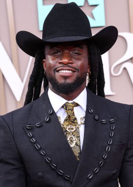 Shaboozey wearing custom Eleven Sixteen by Ugo Mozie arrives at the BET Awards 2025 (25th Annual BET Awards) held at Peacock Theater at L.A. Live on June 9, 2025 in Los Angeles, California, United States. 