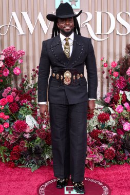 Shaboozey wearing custom Eleven Sixteen by Ugo Mozie arrives at the BET Awards 2025 (25th Annual BET Awards) held at Peacock Theater at L.A. Live on June 9, 2025 in Los Angeles, California, United States. 