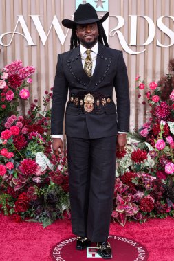 Shaboozey wearing custom Eleven Sixteen by Ugo Mozie arrives at the BET Awards 2025 (25th Annual BET Awards) held at Peacock Theater at L.A. Live on June 9, 2025 in Los Angeles, California, United States. 