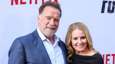 HOLYWOOD, LOS ANGELES, CALIFORNIA, ABD - 11 Haziran: Arnold Schwarzenegger ve Heather Milligan Netflix 'in' FUBAR '2 sezonunun Los Angeles prömiyerine geldiler 