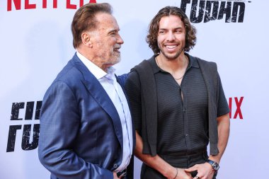 Avusturyalı ve Amerikalı aktör, eski Kaliforniya Valisi, iş adamı, eski politikacı ve eski profesyonel vücut geliştirici Arnold Schwarzenegger ve oğlu / Amerikan aktör ve fitness modeli Joseph Baena Netflix 'in Los Angeles Premiere' ine geldi.