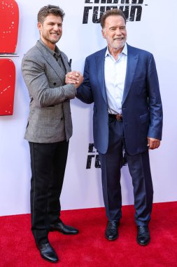Amerikalı aktör Travis Van Winkle ve Avusturyalı ve Amerikalı aktör, eski Kaliforniya Valisi, iş adamı, eski politikacı ve eski profesyonel vücut geliştirici Arnold Schwarzenegger Netflix 'in' FUBARX 'ının Los Angeles Premiere' ine geldiler 