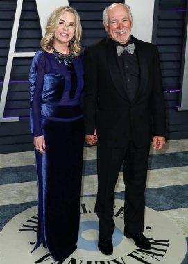 Jimmy Buffetts için 275 milyon dolarlık gayrimenkul kavgası aile güvencesinin risklerini ön plana çıkarıyor. BEVERLY HILLS, LOS ANGELES, CALIFORNIA, ABD - 24 Şubat: Jane Slagsvol ve kocası / Amerikalı şarkıcı-söz yazarı, yazar ve işadamı Jimmy Buffett.