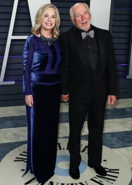 Jimmy Buffetts için 275 milyon dolarlık gayrimenkul kavgası aile güvencesinin risklerini ön plana çıkarıyor. BEVERLY HILLS, LOS ANGELES, CALIFORNIA, ABD - 24 Şubat: Jane Slagsvol ve kocası / Amerikalı şarkıcı-söz yazarı, yazar ve işadamı Jimmy Buffett