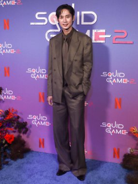 Güney Koreli aktör Park Sung-hoon Netflix 'in' Squid Game '2. sezon Deneyim Fotoğrafı' na 17 Haziran 2025 'te Manhattan, New York, ABD' deki Manhattan AVM 'de ulaştı.. 