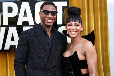 Amerikalı aktör Jonathan Majors ve eşi Amerikan aktris Meagan Good, 20 Haziran 2025 'te Beverly Hilton Hotel' deki Wilshire Garden Avlusu 'nda düzenlenen 5..