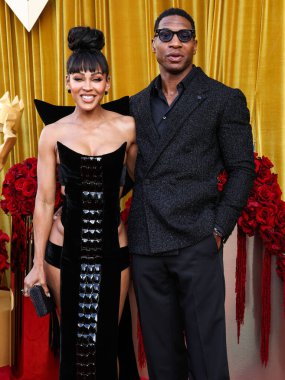 Amerikalı aktris, yapımcı, yönetmen Meagan Good ve kocası / Amerikalı aktör Jonathan Majors, 20 Haziran 2025 'te Beverly Hills, LA' deki Wilshire Garden Avlusu 'nda düzenlenen 5.