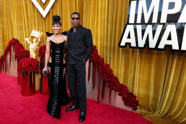 Amerikalı aktris, yapımcı, yönetmen Meagan Good ve kocası / Amerikalı aktör Jonathan Majors, 20 Haziran 2025 'te Beverly Hills, LA' deki Wilshire Garden Avlusu 'nda düzenlenen 5.