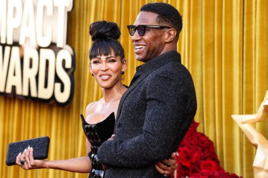Amerikalı aktris, yapımcı, yönetmen Meagan Good ve kocası / Amerikalı aktör Jonathan Majors, 20 Haziran 2025 'te Beverly Hills, LA' deki Wilshire Garden Avlusu 'nda düzenlenen 5.