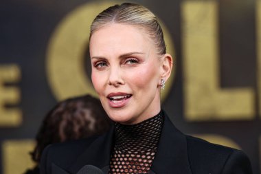 Givenchy giyimli Güney Afrikalı aktris ve yapımcı Charlize Theron, Netflix 'in 25 Haziran 2025' te Hollywood, Los Angeles, Kaliforniya, ABD 'de düzenlenen Netflix Tudum Tiyatrosu' nun 'Eski Muhafız 2' galasına geldi.. 