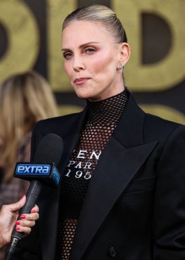 Givenchy giyimli Güney Afrikalı aktris ve yapımcı Charlize Theron, Netflix 'in 25 Haziran 2025' te Hollywood, Los Angeles, Kaliforniya, ABD 'de düzenlenen Netflix Tudum Tiyatrosu' nun 'Eski Muhafız 2' galasına geldi.. 