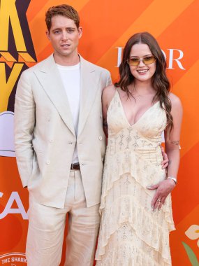 Dakota Brubaker ve kız arkadaşı / Amerikalı aktris, manken, sosyal medya etkileyicisi ve sanatçı Ava Phillippe (Ava Elizabeth Phillippe), Universal Studios Backlot 'ta düzenlenen Charlize Theron Africa Yardım Projesi (CTAOP) Blok Partisi 2025' e geldiler. 