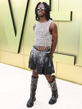 Amerikalı şarkıcı, rapçi ve söz yazarı Lil Nas X (Montero Lamar Hill), 9 Mart 2023 tarihinde Batı Hollywood, Los Angeles, Kaliforniya, ABD 'de düzenlenen Versace Fall / Winter 2023 Moda Fuarı' na geldi..
