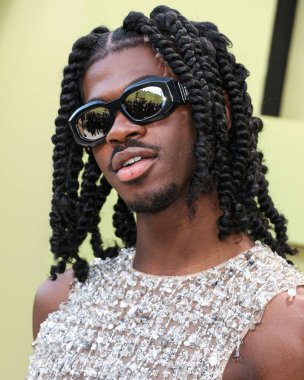 Amerikalı şarkıcı, rapçi ve söz yazarı Lil Nas X (Montero Lamar Hill), 9 Mart 2023 tarihinde Batı Hollywood, Los Angeles, Kaliforniya, ABD 'de düzenlenen Versace Fall / Winter 2023 Moda Fuarı' na geldi..