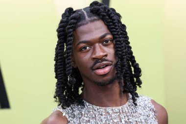 Amerikalı şarkıcı, rapçi ve söz yazarı Lil Nas X (Montero Lamar Hill), 9 Mart 2023 tarihinde Batı Hollywood, Los Angeles, Kaliforniya, ABD 'de düzenlenen Versace Fall / Winter 2023 Moda Fuarı' na geldi..