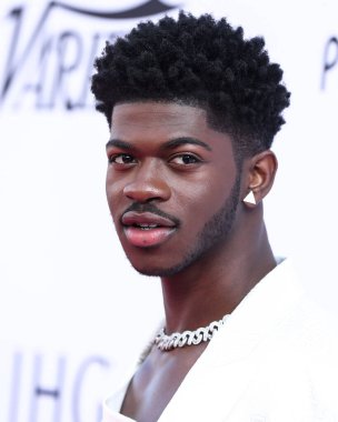 Balmain giyen rapçi Lil Nas X, Peacock ve Girls5eva tarafından sunulan ve 4 Aralık 2021 tarihinde Los Angeles, Kaliforniya, ABD 'deki City Market Social House' da düzenlenen IHG Otelleri ve Resorts sponsorluğundaki Music Hitmakers Brunch 'a geldi.