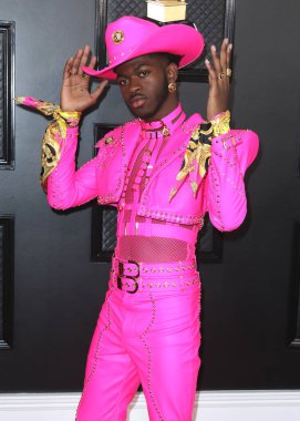 Versace giyen şarkıcı Lil Nas X, 26 Ocak 2020 'de Los Angeles, Kaliforniya, ABD' deki Staples Center 'da düzenlenen 62.