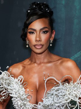 Amerikalı aktris, model, şarkıcı, yazar ve girişimci Erica Mena Samuels, 27 Ağustos 2025 'te Hollywood, Los Angeles, Kaliforniya, ABD' de bulunan TCL Çin Tiyatrosu IMAX 'te düzenlenen Los Angeles Film' Run 'ın Los Angeles galasına geldi.. 