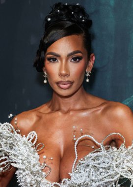 Amerikalı aktris, model, şarkıcı, yazar ve girişimci Erica Mena Samuels, 27 Ağustos 2025 'te Hollywood, Los Angeles, Kaliforniya, ABD' de bulunan TCL Çin Tiyatrosu IMAX 'te düzenlenen Los Angeles Film' Run 'ın Los Angeles galasına geldi.. 