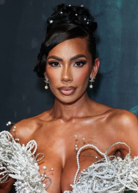 Amerikalı aktris, model, şarkıcı, yazar ve girişimci Erica Mena Samuels, 27 Ağustos 2025 'te Hollywood, Los Angeles, Kaliforniya, ABD' de bulunan TCL Çin Tiyatrosu IMAX 'te düzenlenen Los Angeles Film' Run 'ın Los Angeles galasına geldi.. 