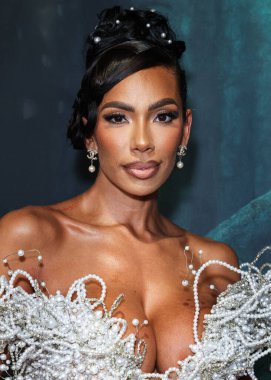 Amerikalı aktris, model, şarkıcı, yazar ve girişimci Erica Mena Samuels, 27 Ağustos 2025 'te Hollywood, Los Angeles, Kaliforniya, ABD' de bulunan TCL Çin Tiyatrosu IMAX 'te düzenlenen Los Angeles Film' Run 'ın Los Angeles galasına geldi.. 
