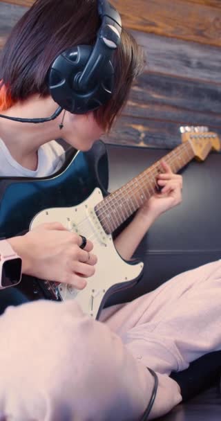 Year Old Girl Headphones Plays Electric Guitar Slow Motion Vertical — Stock Video