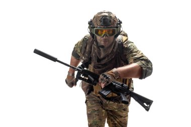 A professional mercenary soldier leaving the kill zone on contact with the enemy. Isolated on white background.
