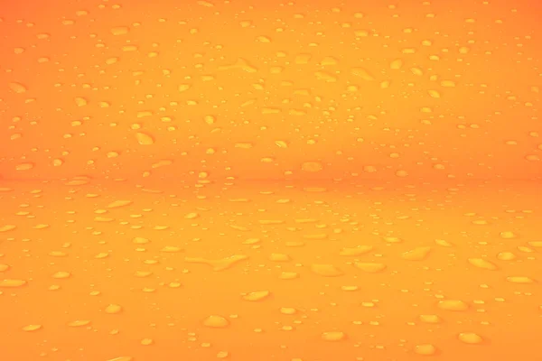 オレンジ色の背景に濁った水が落ちます 水滴は背景を詳述する 水のスプラッシュ 水スプレーの背景 水滴と穏やかなオレンジの背景 — ストック写真