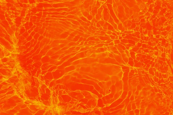 Defocus Elmosódott Átlátszó Narancs Színű Tiszta Nyugodt Vízfelület Textúra Fröccsenések — Stock Fotó