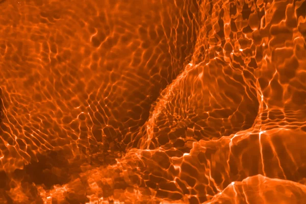 Defocus Wazig Transparant Oranje Gekleurd Helder Kalme Water Oppervlak Textuur — Stockfoto