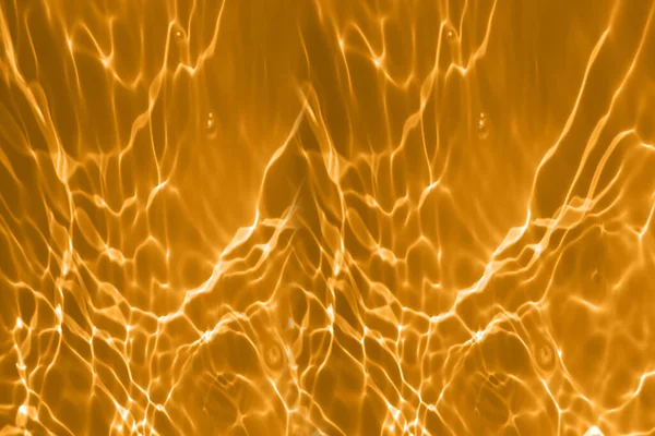 Defokus Rozmazal Průhlednou Oranžovou Barvu Čistou Klidnou Strukturu Vodní Hladiny — Stock fotografie