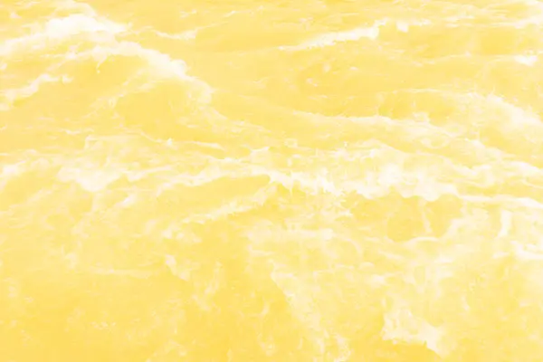 Desenfoque Borrosa Transparente Color Amarillo Claro Textura Superficie Del Agua —  Fotos de Stock