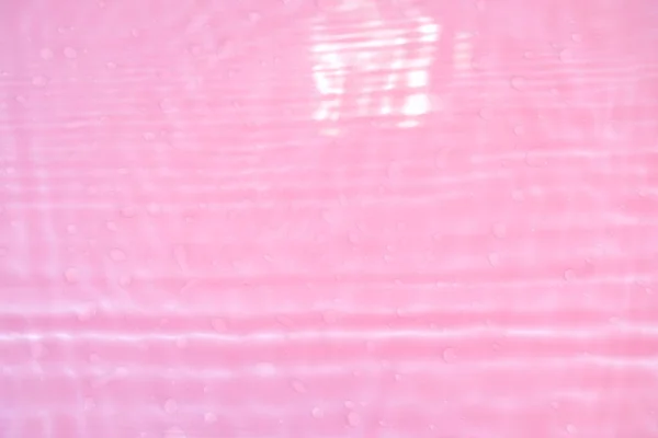 Defocus Wazig Transparant Roze Gekleurd Helder Kalme Water Oppervlak Textuur — Stockfoto