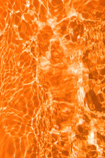 Defocus Verschwommen Transparent Orange Gefärbte Klare Oberflächenstruktur Des Wassers Mit — Stockfoto
