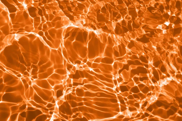 Defokus Rozmazal Průhlednou Červenooranžovou Barvu Jasnou Klidnou Strukturu Vodní Hladiny — Stock fotografie