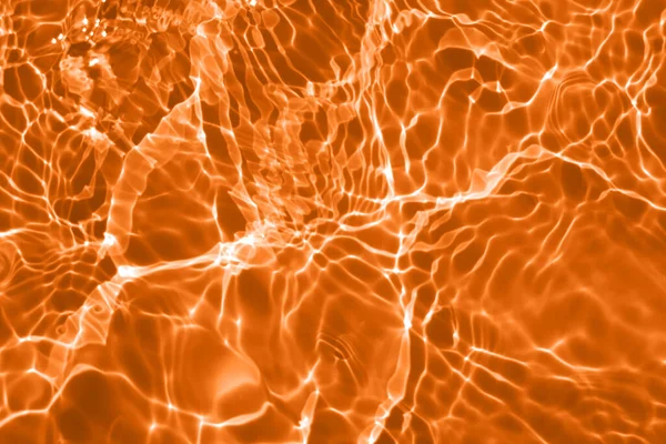 Размытие Размыло Прозрачно Красно Оранжевый Цвет Прозрачной Спокойной Поверхности Воды — стоковое фото